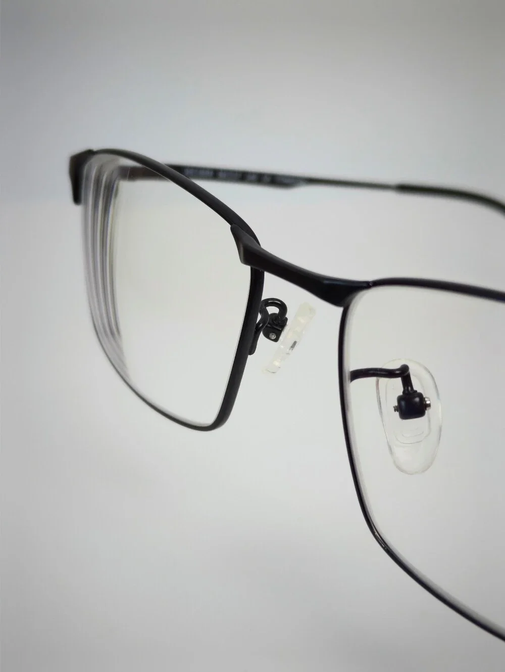 Decider. Womens Black Low Gloss Rectangular Titanium Frame.